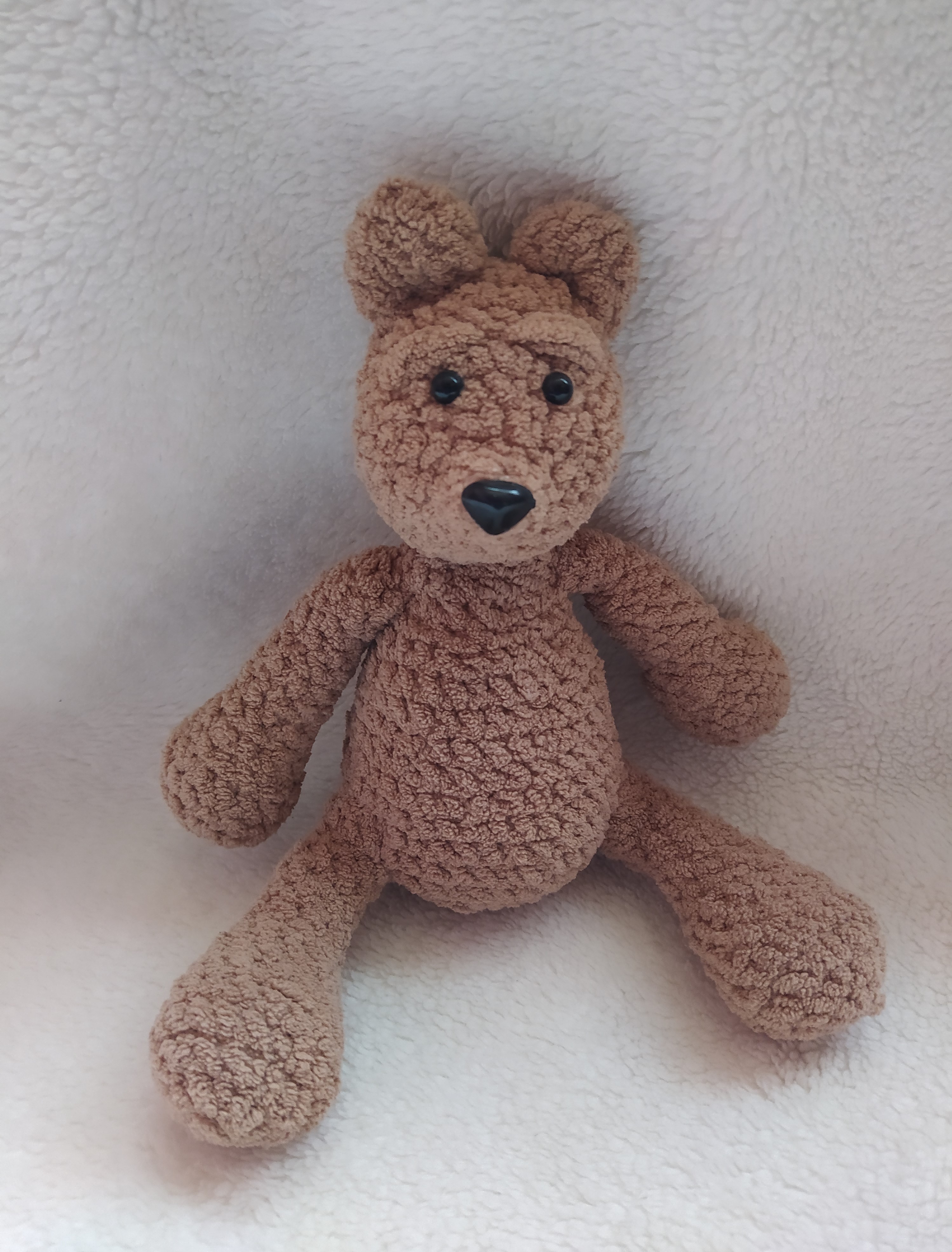 Hand-woven toy bear