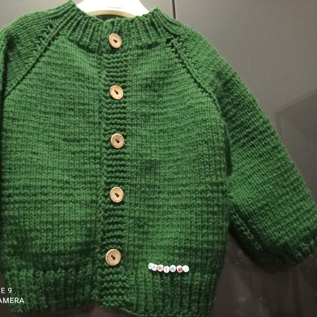Hand-knitted jacket with baby name